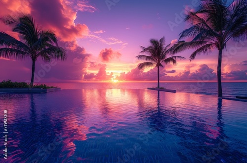 a private pool at sunset is lined with palm trees