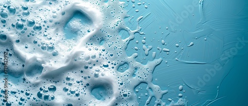 spot of thick shampoo foam on a blue background