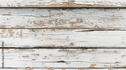 white horizontal wooden planks where the paint has flaked off or is damaged here and there.