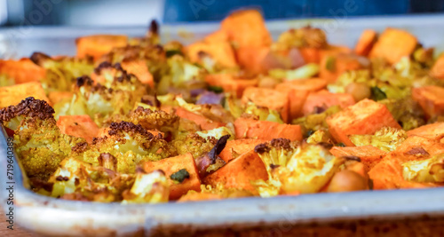 Healthy fresh meal, baked vegetables. Homemade delicious lunch with carrot, cauliflower for restaurant, menu, advert or package, close up selective focus