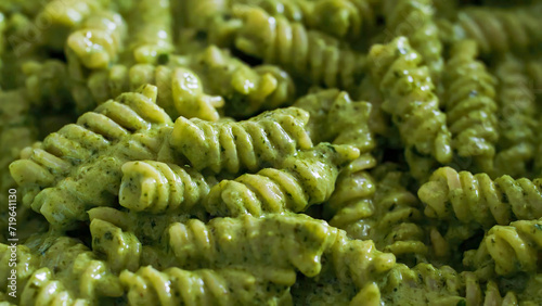 Pasta pesto, parmesan cheese, basil. Delicious homemade pasta dish, serving food for restaurant, menu, advert or package, close up, selective focus