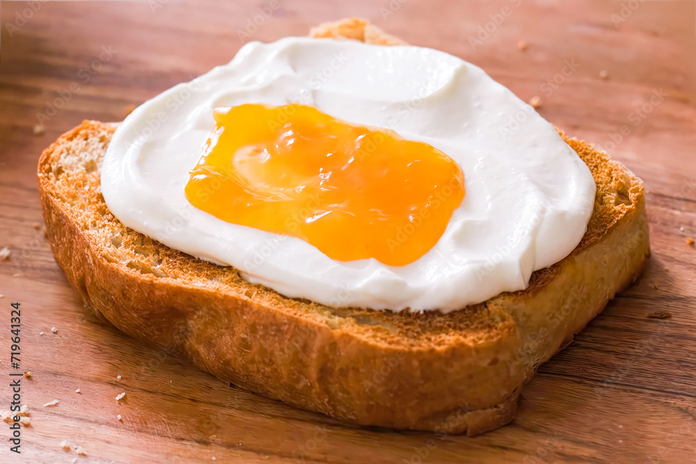 Toast with with cheese on wooden board. Healthy vegetarian breakfast, toasted bread with avocado, for menu, advert or package, selective focus Toast with with cheese on wooden board. Healthy vegetarian breakfast, toasted bread with avocado, for menu, advert or package, selective focus