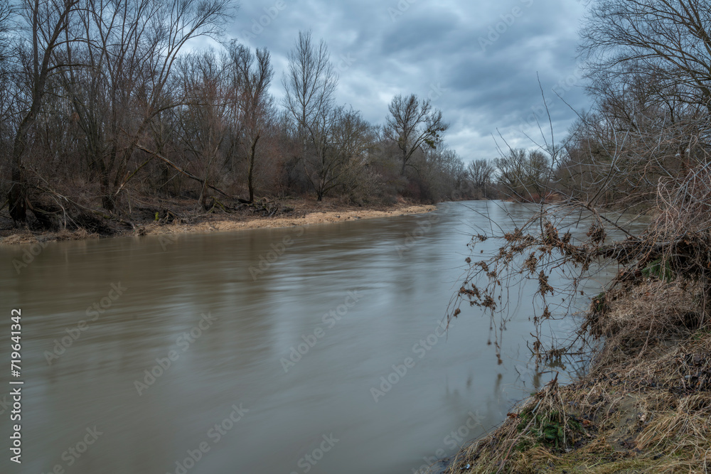 Becva river near Prerov town in cloudy cold winter morning Becva river near Prerov town in cloudy cold winter morning