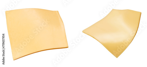 Square slices of processed cheese isolated on white background photo