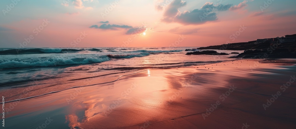 pastel color sunset reflected on the beach. Copy space image. Place for adding text