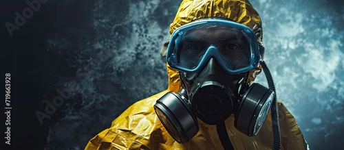 Researcher wearing hazmat protective suit and safety goggles. Copy space image. Place for adding text