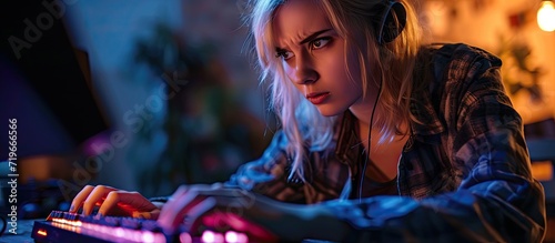 Young blonde woman playing video games holding keyboard skeptic and nervous frowning upset because of problem negative person. Copy space image. Place for adding text photo