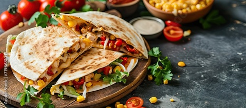 Quesadilla with chicken tomatoes corn cheese and chilli Mexican food Fast food. Copy space image. Place for adding text