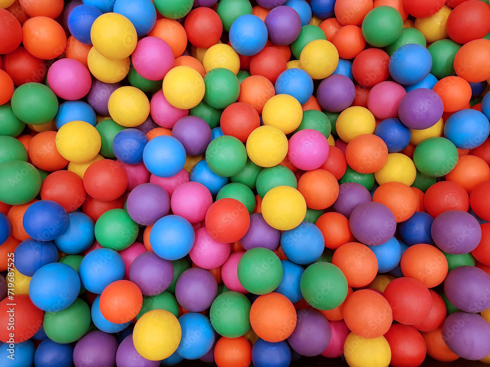 Many color plastic balls background.