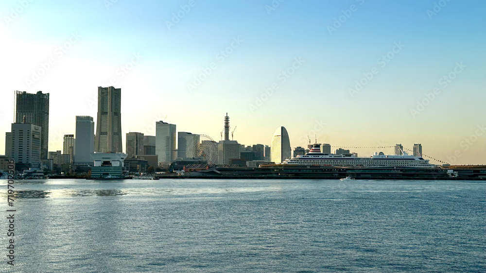 Yokohama skyline with a body of water in the foreground