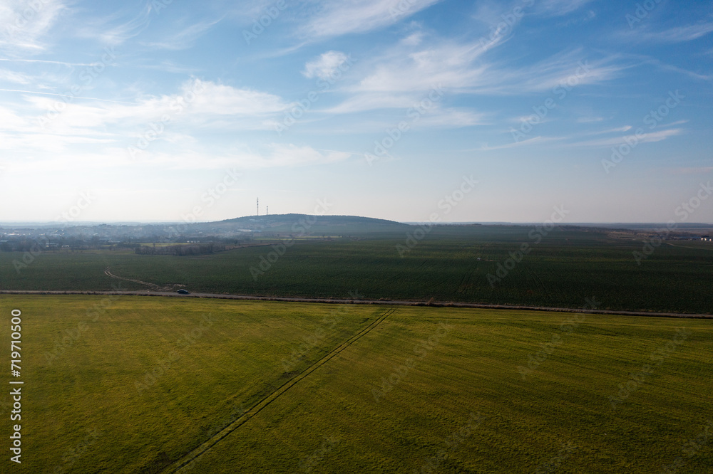Countryside Canopy: Aerial Composition of Fields and Blue Skies