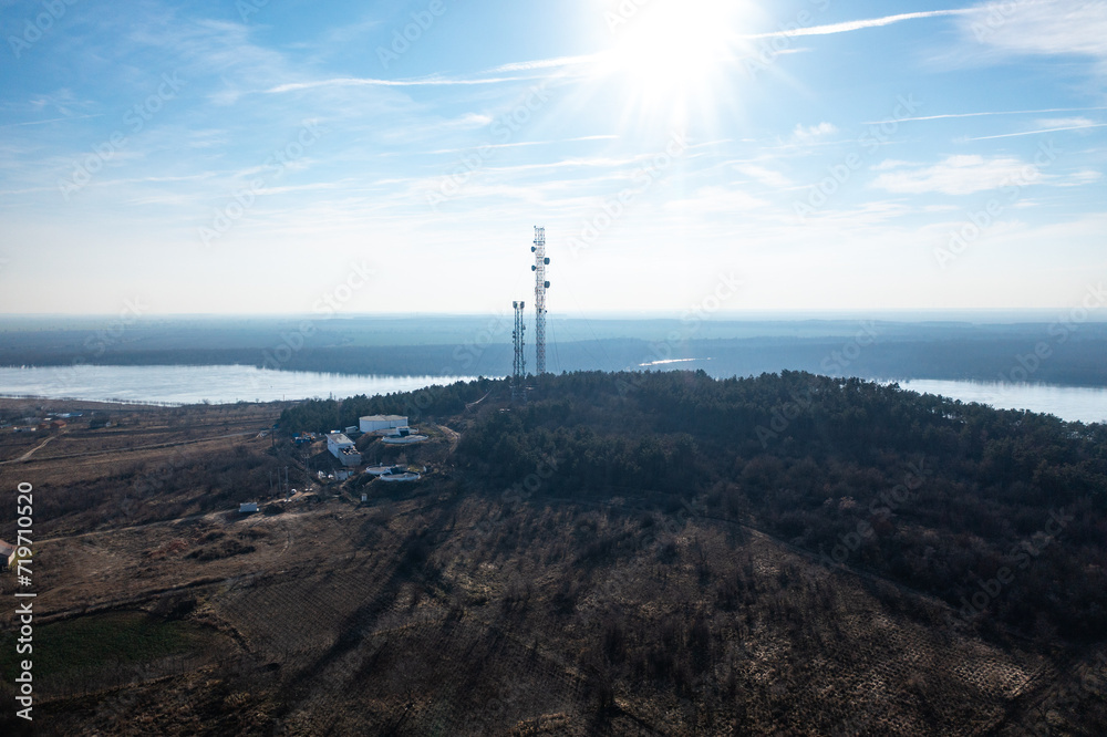 Elevated Connections: Aerial View of Telecommunication Tower on Mountain