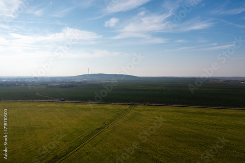 Countryside Canopy: Aerial Composition of Fields and Blue Skies © Cruceru
