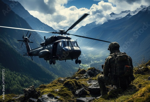 A solitary soldier gazes out at the majestic mountain range, as the thunderous roar of a military helicopter's rotor fills the sky above him photo
