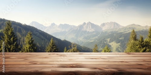 Mountainous area with a focused wooden table.