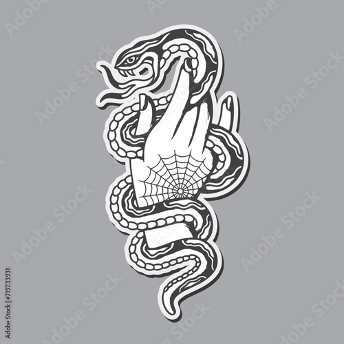 Traditional tattoo of snake in hand.