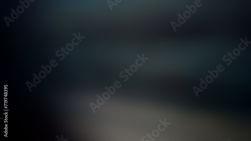blurred black background .abstract blurred background .Elegant wave background.Backdrop for presentation. Background for products. Abstract gradient backdrop. Gray bokeh backdrop. Free space for text.