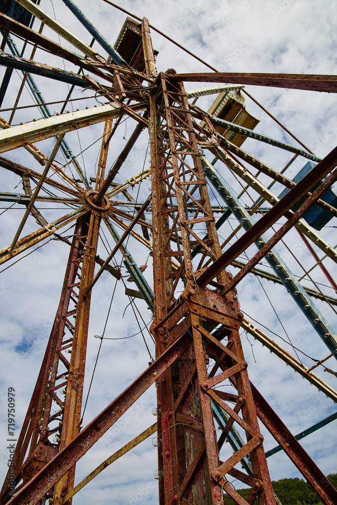 Rusting Ferris Wheel in Abandoned Theme Park, Low-Angle View