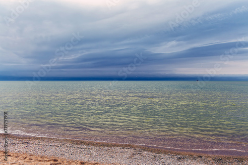 Summer storm clouds form over Grand Bend beach - Lake Huron, Ontario, Canada