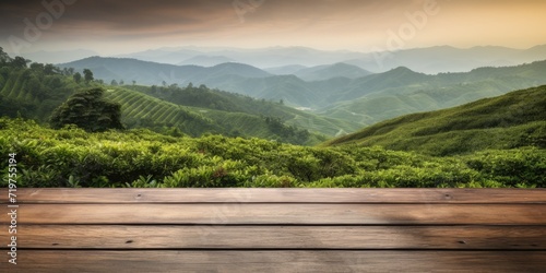 Tea plantation background with empty wooden table or desk for product display.