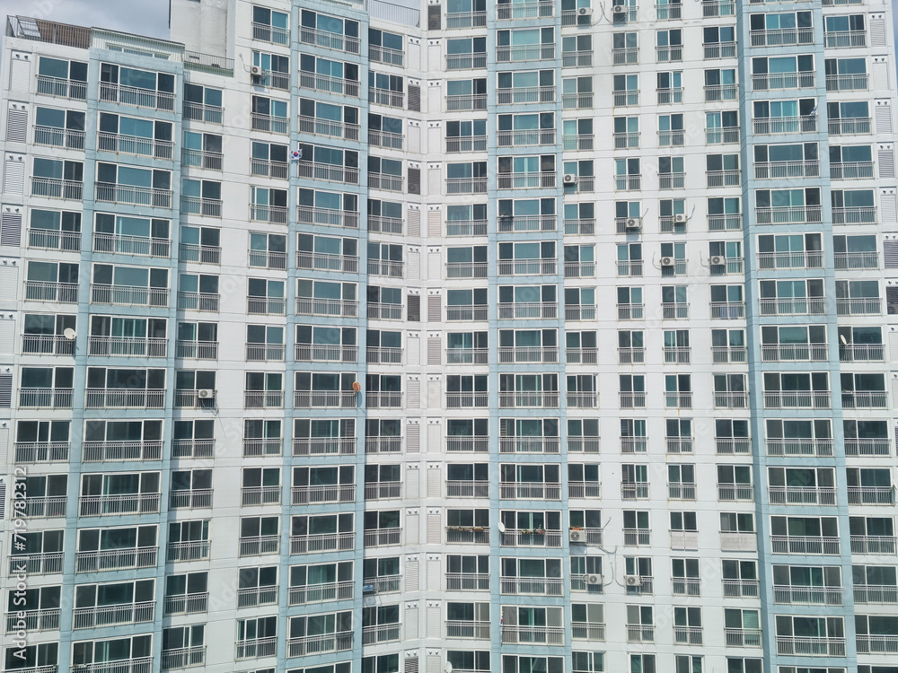 Close-up of an apartment full of windows.