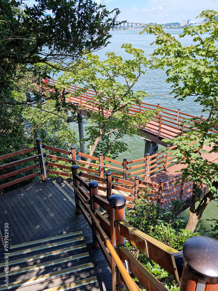 This is an outdoor park with downhill stairs.