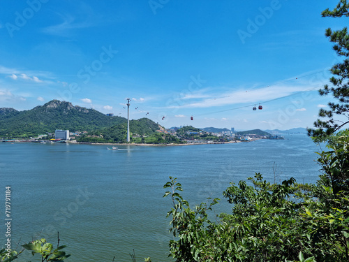 This is a seascape with a cable car. photo