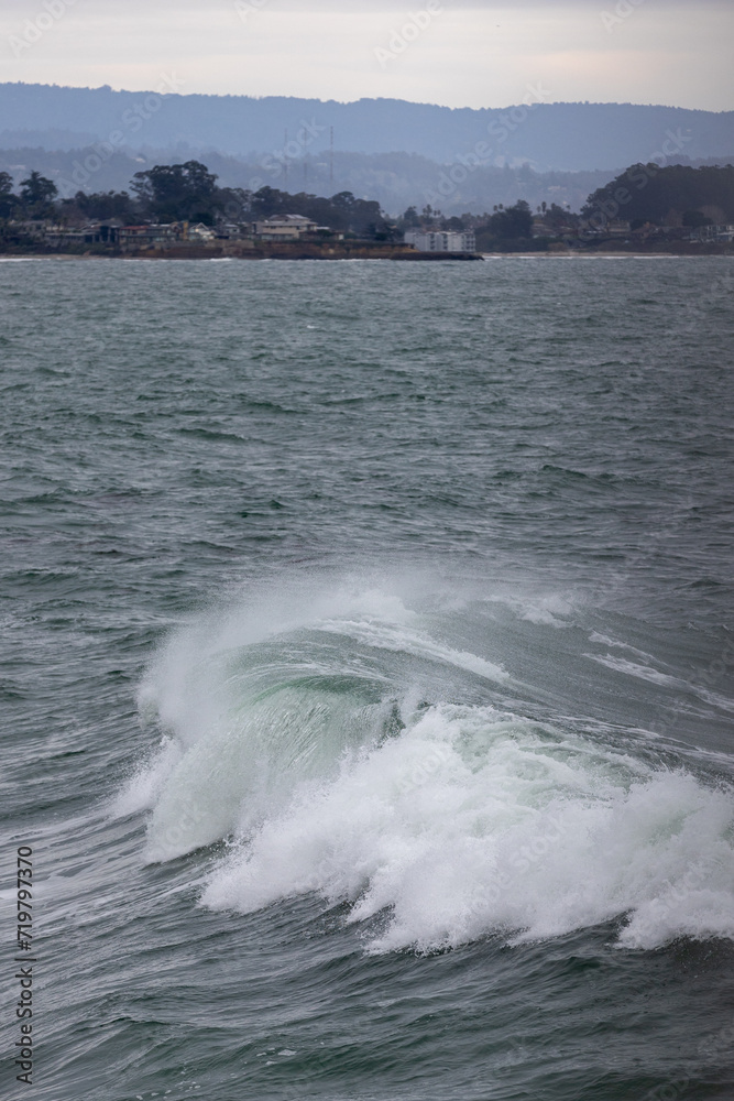Fototapeta premium Wave crashing against Santa Cruz coast