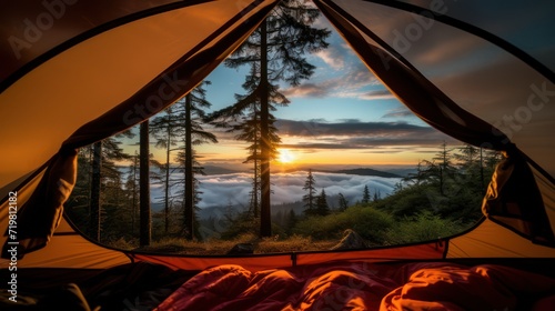 Morning view at the top of the mountain from inside a climber's camping tent.