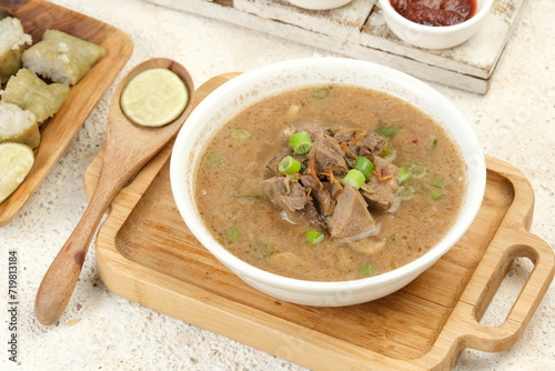 Coto Makassar, traditional food from Makassar, South Sulawesi. photo