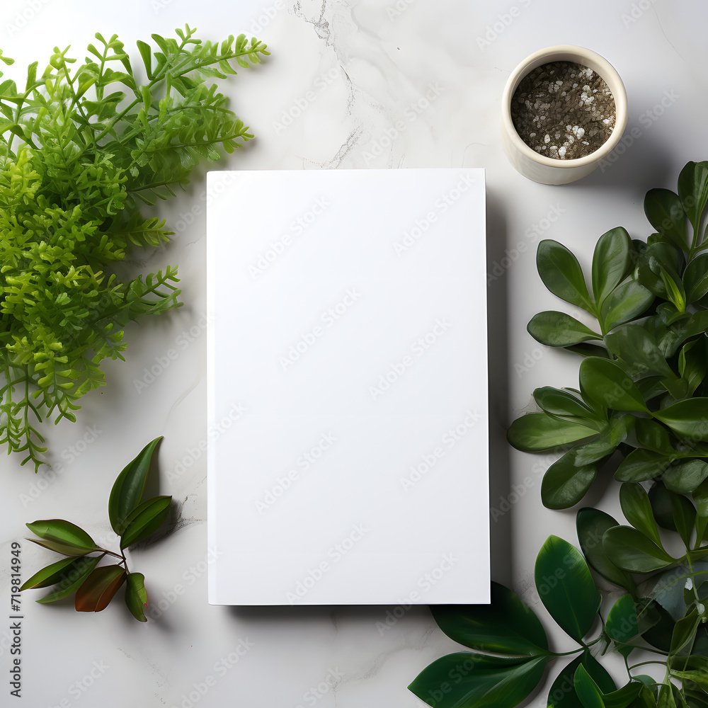 Minimal white hardcover book mockup on the desk with plants Minimal white hardcover book mockup on the desk with plants
