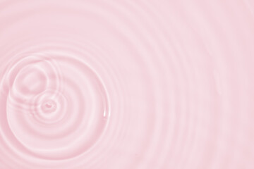 Abstract transparent water shadow surface texture natural ripple on pink background