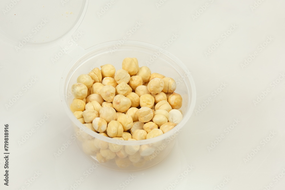 Chickpeas in Small Bowl Isolated on White Background Chickpeas in Small Bowl Isolated on White Background