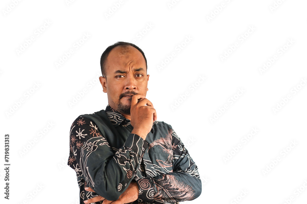 handsome man wearing batik shirt is thinking handsome man wearing batik shirt is thinking
