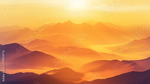 Golden sunrise illuminating the misty mountains. © Media Srock