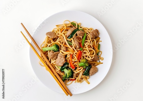 Plate of noodles with meat and vegetables isolated on white background, top view : Generative AI