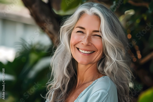 gray haired older woman smiling