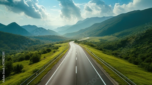 An empty mountain highway on a sunny day, bird eye view © Jennifer