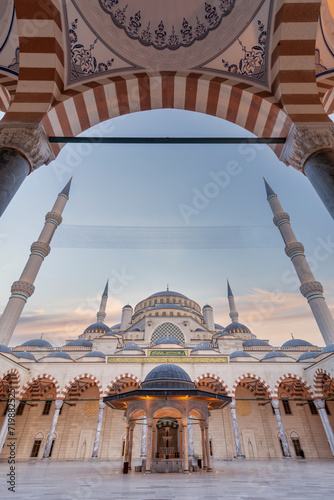 Sunset shot of Courtyard of Grand Camlia Mosque, or Buyuk Camlica Camii, a modern Islamic complex, built in 2019, located in Camlica hill in Uskudar district, Istanbul, Turkey photo