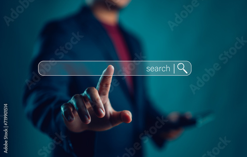 Data Search Technology, Search Engine Optimization. Man's hands use smartphone and touching on search bar to searching for data information. Using Search Console with your website..