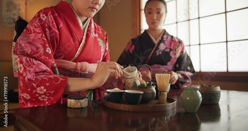 Slika na platnu Traditional, teapot and Japanese women with tea for culture with herbs, leaves and flavor in home