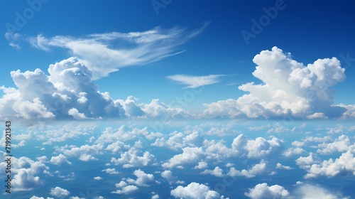 A captivating cobalt blue sky filled with fluffy white clouds