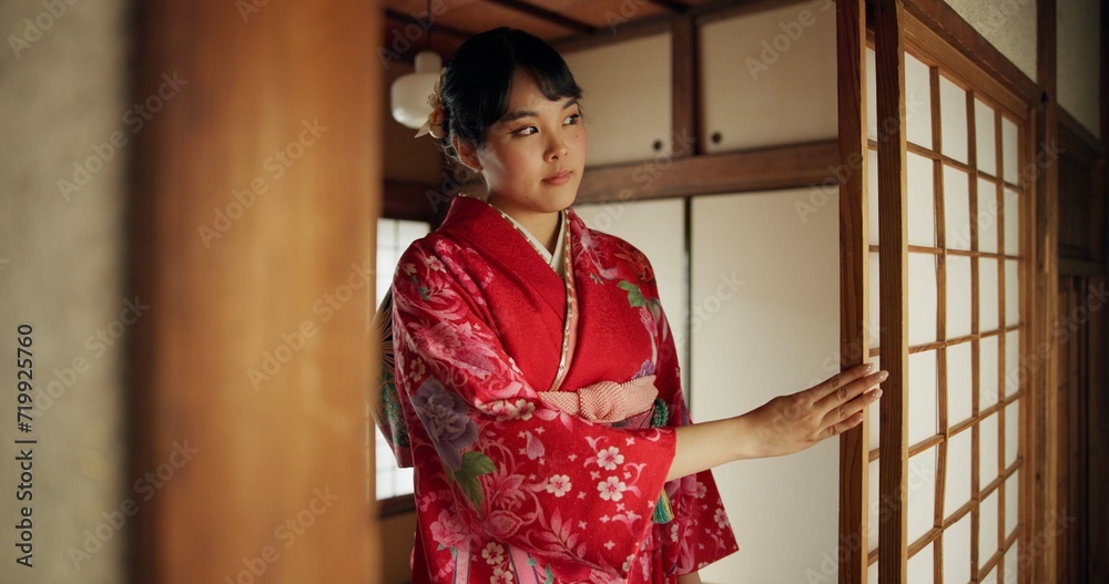Japanese, woman and kimono in corridor for tradition, tea ceremony and hallway of Chashitsu room or door. Entrance, person and vintage dress or fashion for temae, ritual and waiting for hospitality