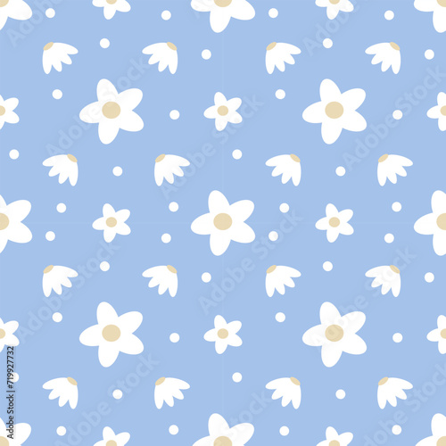 Seamless pattern with white cute daisies on blue background 
