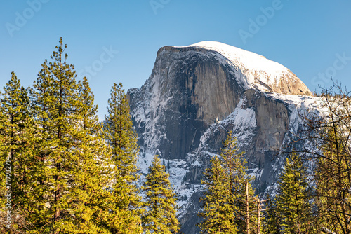 View of the Half Dome and the Merced River from the Sentinel Bridge in Yosemite National Park photo