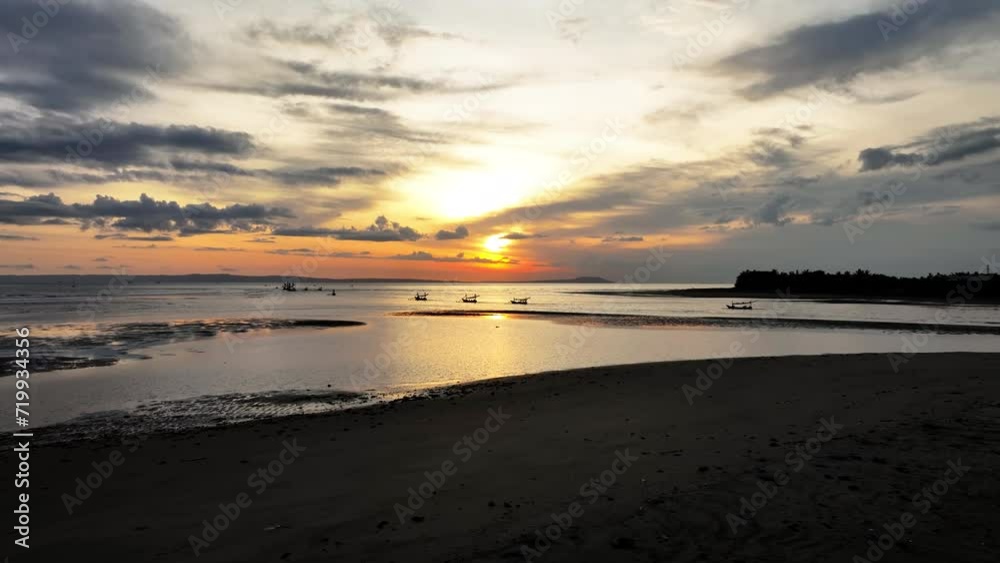 Aerial View of Sunset on Bali Beach with Fishing Boats Aerial View of Sunset on Bali Beach with Fishing Boats