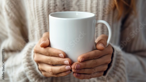 woman in white cozy sweater holding a white coffee mug for coffee mug mockup design with a blank space, Generative AI. photo