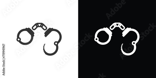 handcuffs on black and white background photo