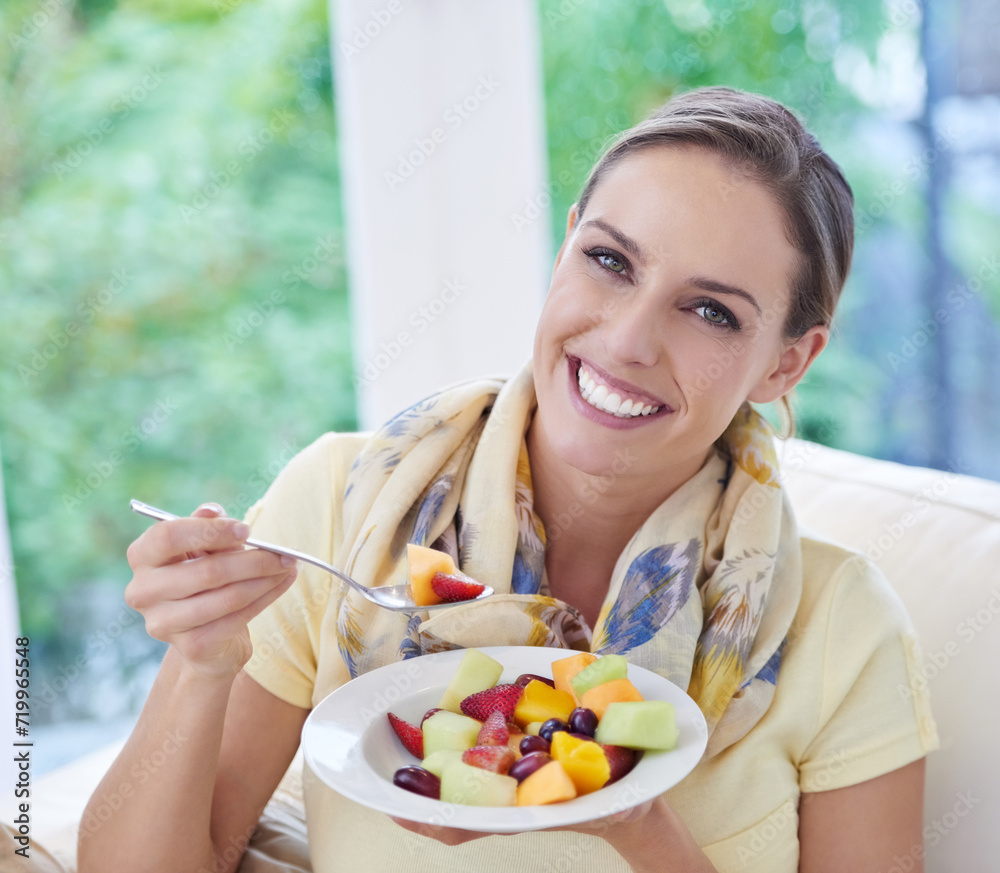 Healthy food, woman in portrait with fruit salad and diet, organic product and relax on sofa with smile for weight loss. Vegan meal, gut health and wellness, eating for nutrition with vitamins Healthy food, woman in portrait with fruit salad and diet, organic product and relax on sofa with smile for weight loss. Vegan meal, gut health and wellness, eating for nutrition with vitamins