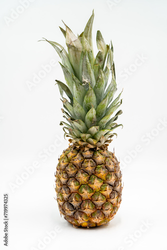 Pineapple close up on white background isolated.